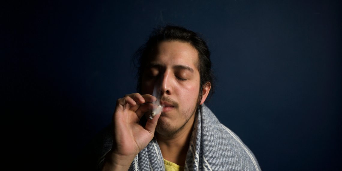 Rolling papers crinkle, anticipation builds for that first sacred puff